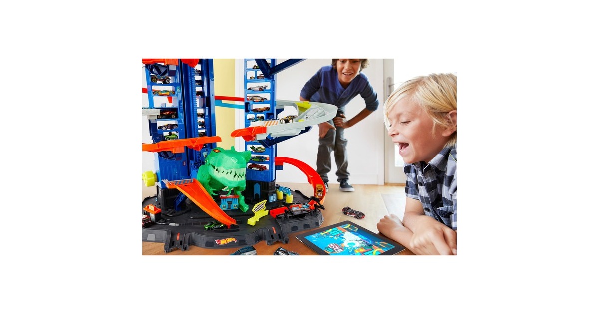 Hot Wheels Megacity Parkgarage mit T-Rex-Angriff, Spielgebäude(Inkl. 2 Hot Wheels Fahrzeuge)