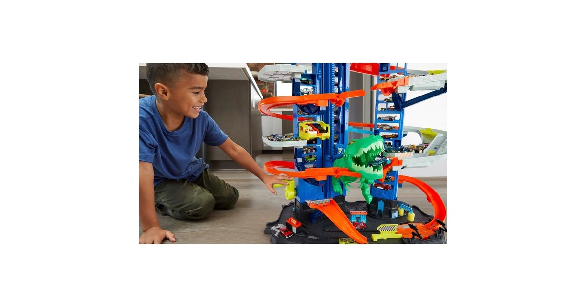 Hot Wheels Megacity Parkgarage mit T-Rex-Angriff, Spielgebäude(Inkl. 2 Hot Wheels Fahrzeuge)