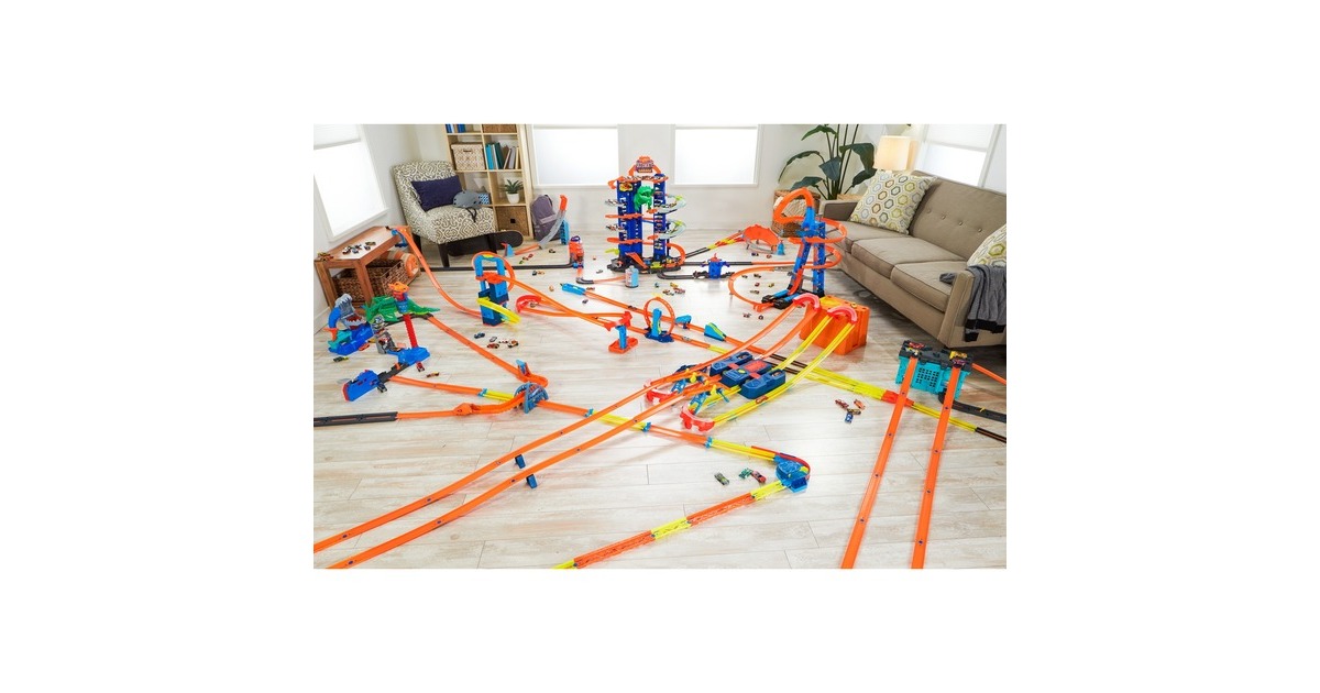 Hot Wheels Megacity Parkgarage mit T-Rex-Angriff, Spielgebäude(Inkl. 2 Hot Wheels Fahrzeuge)