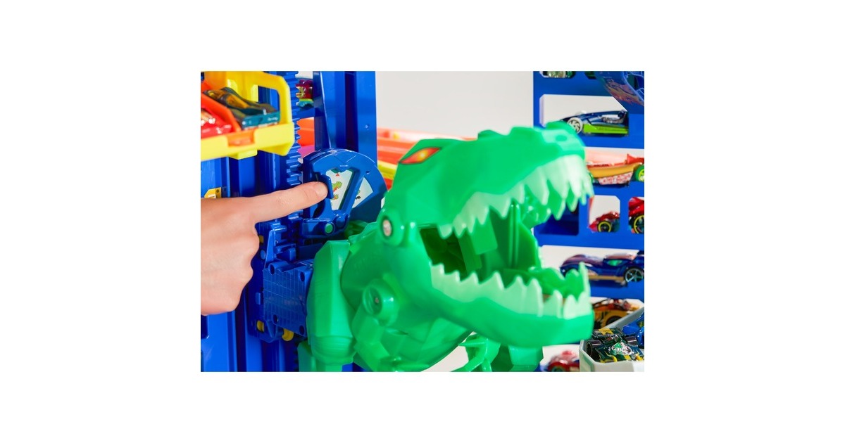 Hot Wheels Megacity Parkgarage mit T-Rex-Angriff, Spielgebäude(Inkl. 2 Hot Wheels Fahrzeuge)